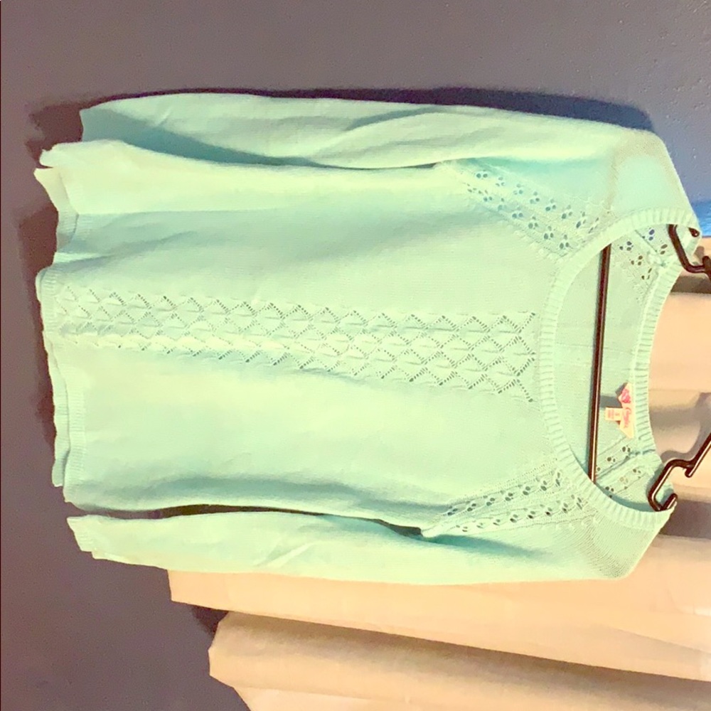 Candie’s sweater with button down back